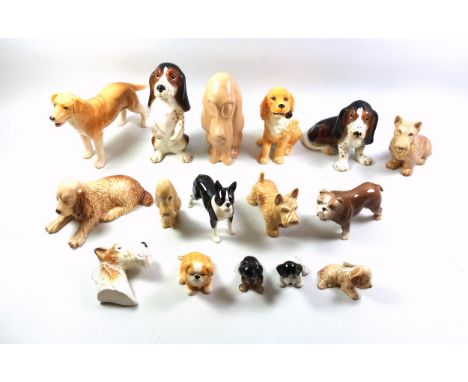 15 Sylvac models of dogs, H.18.5cm the tallest, and a terrier's head. (16)