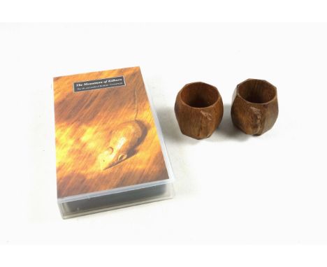 Pair of Mouseman, (Robert Thompson of Kilburn), carved oak napkin rings, each octagonal and with trademark mouse in relief, H