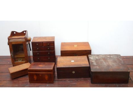 Edwardian oak smoker's cabinet with a galleried top, 2 folding pipe racks, glazed door enclosing a further rack and a drawer,