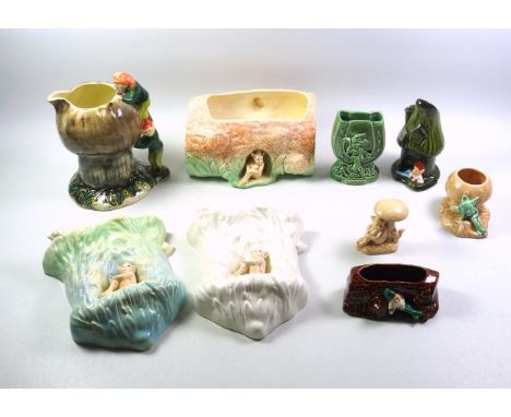 Sylvac mushroom or toadstool jug, the handle formed as 2 pixies/gnomes, 1969, H.20.5cm; log shaped pixie planter, W.21.5cm; 2