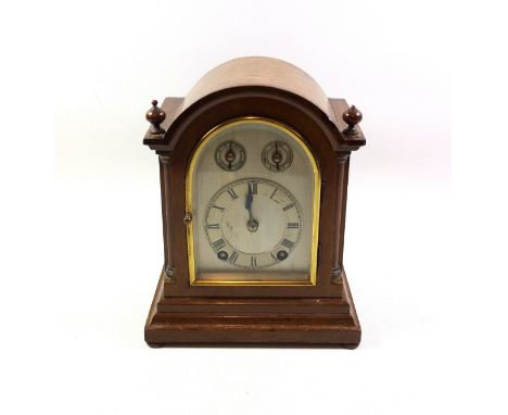 Small Early 20th Century German mantel clock, the silvered dial black Roman numerals and 2 subsidiary dials, enclosing an 8 d