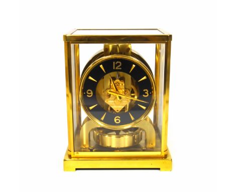 Jaeger-LeCoultre Atmos timepiece, the clear dial with a black chapter ring, applied gilt Arabic numerals at each quarter, and