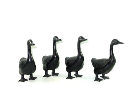 Set of 4 bronze models of ducks, standing, H.22.5cm. (4)