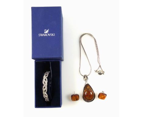 Swarovski curled bangle, rhodium plated clear crystal No. 5129334 ,original box and ticket; a pair of white metal square cabo