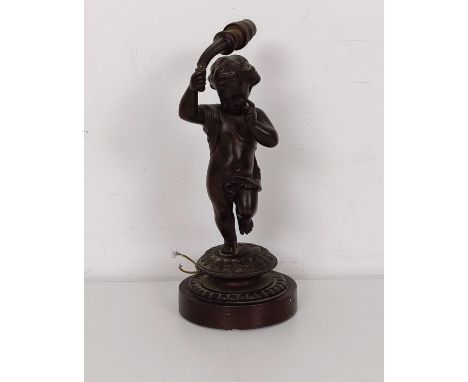 A bronze lamp base, in the form of a young child, on a circular base, 22 cm highThe mount support is split 
