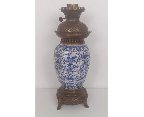 A Delft oil lamp, with metal mounts, 45 cm 
