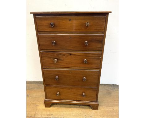 A mahogany chest, having five drawers, 60 cm wide, a cupboard, a pedestal, two stools, a two tier table, and a corner shelf (