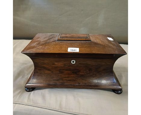 A 19th century rosewood tea caddy, a hinged lid to reveal a cut glass mixing bowl, repaired, and two caddies, 40 cm wide 