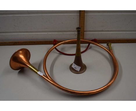 A copper hunting horn and a small hunting horn (2)