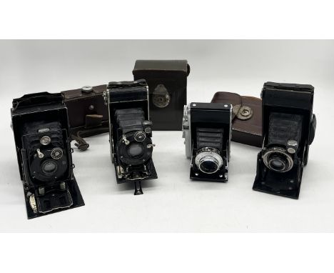 A collection of four vintage Voigtlander Cameras including Bessa, 120 etc.