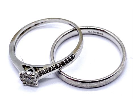 A set of 9ct white gold diamond cluster engagement ring and 18ct white gold wedding band- wedding band weight 2.3g, cluster r