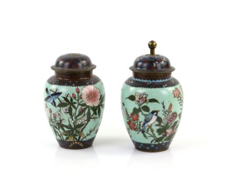 A Pair of Japanese cloisonné vases ; each one with domed cover and knop finial, decorated on the green ground with kacho-ga o