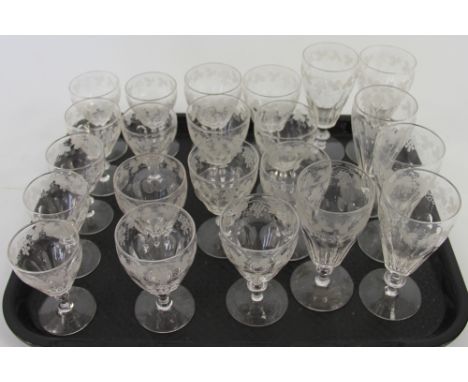 A collection of vine engraved glasses, early 20th century, each with knopped stem and half faceted body, to include; seven sh