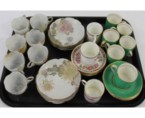 A set of six Grosvenor China shagreen decorated coffee cans and saucers, with gilt detail, a set of seven Japanese eggshell p