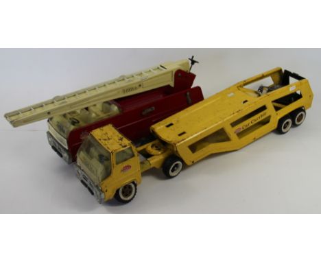 A Tonka Toys yellow car transporter; and a fire engine (2) (size)