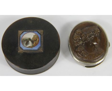 A 19th century tortoiseshell circular snuff box, the lid set with a micromosaic of a waterfall within a white metal surround,
