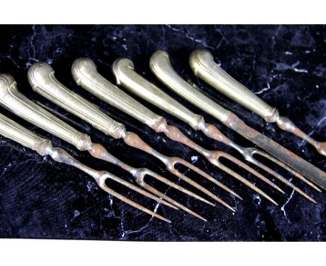 A collection of early 19th century, two prong, silver pistol grip forks, to include a set of eleven forks, along with a furth