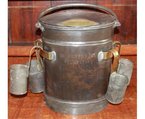 A 19th century iron and brass milk churn, with brass makers badge for Dairy Outfit Co Ltd, makers, Kings Cross London, the li