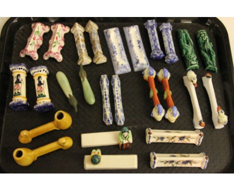 Thirteen pairs of ceramic novelty knife rests, to include; duckling and beetle example, leaf moulded, green glazed examples, 