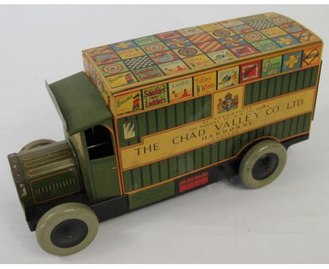 A Chad Valley clockwork 'Games Van', with lithograph decoration of toys, Chad Valley Works Harbone, 25cm