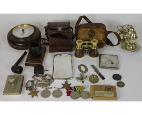 A silver cigarette case, London 1912; various WWII medals, a pair of lacquered brass binoculars; a match tidy made from the t