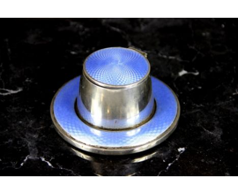 A silver and enamel ink well Charles S Green & Co Ltd, Birmingham 1927, the silver desk well inset with pale blue guilloche e