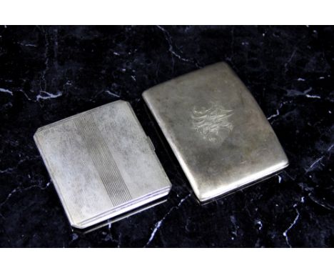 A silver cigarette case, with engine turned decoration, engraved name to interior, William Neale & Son, Birmingham 1947 and a