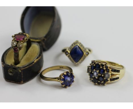 A lapis lazuli, diamond and amethyst set dress ring, in 9ct yellow gold, a sapphire cluster set dress, all set in 9ct yellow 