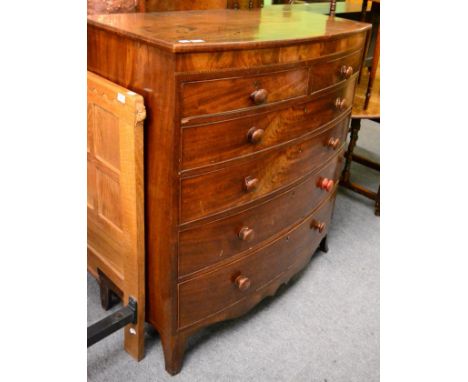 A George III mahogany five height bow fronted chest of drawers 