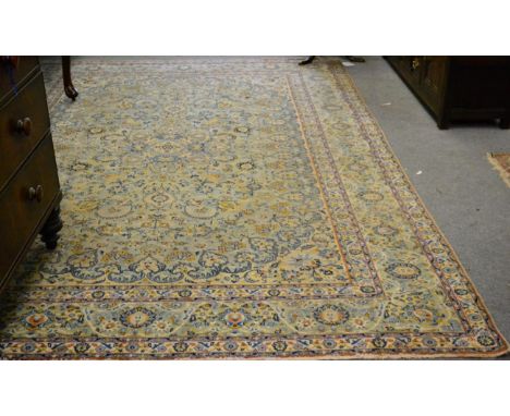 Kashan carpet, Central Iran, the duck egg blue field of vines around a flowerhead pole medallion framed by palmette borders 