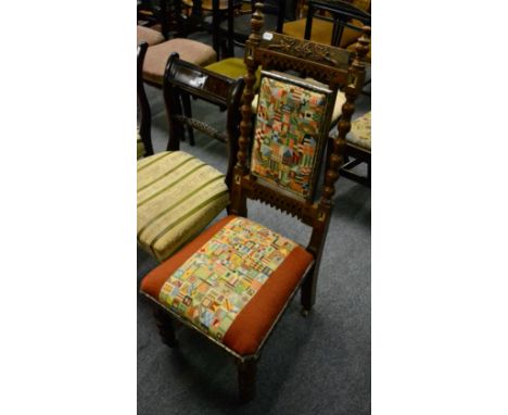 A Victorian carved oak side chair with tapestry upholstery 