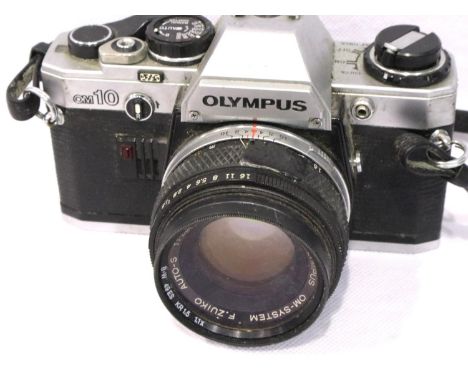 Olympus OM10 35mm camera body with Zuiko 50mm lens. P&amp;P Group 1 (£14+VAT for the first lot and £1+VAT for subsequent lots