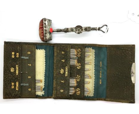 Unusual screw fix needle work, work station pin cushion and a vintage leather case of sewing needles. P&amp;P Group 2 (£18+VA
