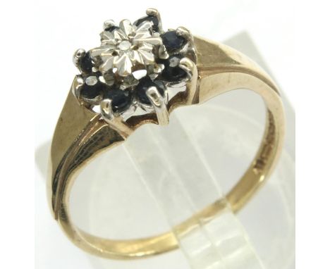 9ct gold diamond and sapphire set daisy ring, size L, 2.0g. P&amp;P Group 1 (£14+VAT for the first lot and £1+VAT for subsequ