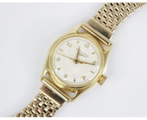 A ladies Longines wristwatch, the circular cream dial with Arabic and baton markers, set to a gold coloured case (assessed as