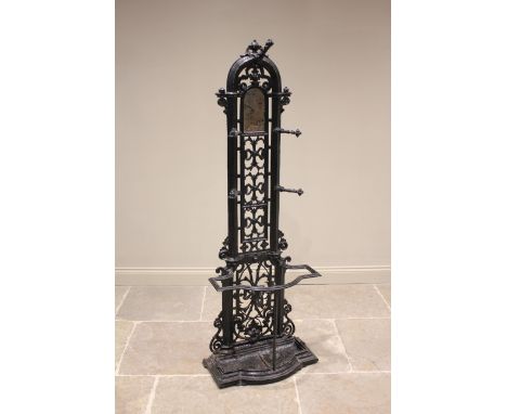 A Victorian Coalbrookdale style hall stand, the reeded arched frame extending to five oak leaf and acorn branches, and enclos