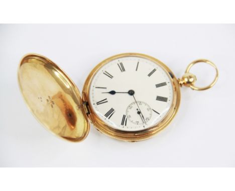 A Victorian 18ct gold full hunter pocket watch, the circular white enamel dial with Roman numeral markers and subsidiary seco