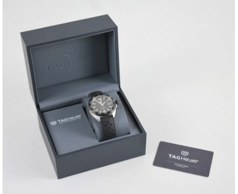 A Tag Heuer Formula 1 wristwatch, with chapter dial and date aperture, attached rubber strap, case number WAZ1110 WZQ5267, bo