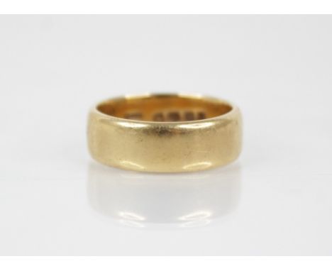 A George V 18ct gold wedding band, marks for 'HG&amp;S', Birmingham 1919, ring size R, weight 10.6gms, band width 6.5mm, band