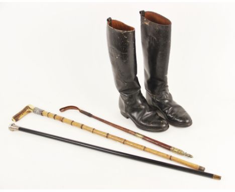 An early 20th century silver mounted walking cane, the tapering ebonised wooden cane with silver knopped handle, Kendall &amp