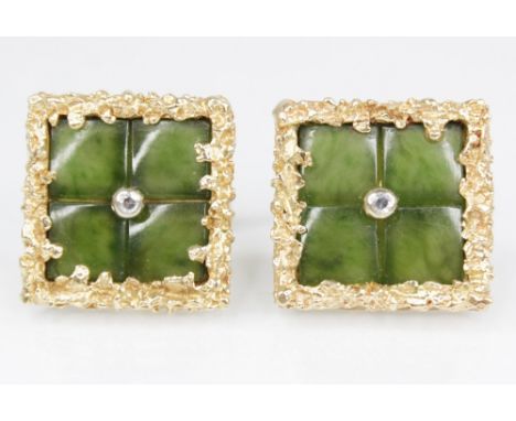 A pair of jadeite, diamond and gold coloured cufflinks, each of square form set with nephrite jade panels and a single cut di