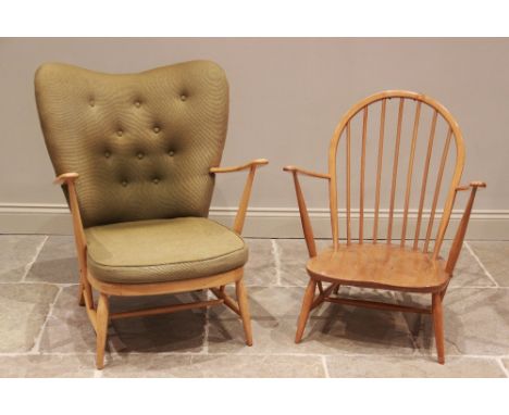 An Ercol beech wood open armchair, in green fabric, the shaped button back extending to up swept arms above the bow front loo