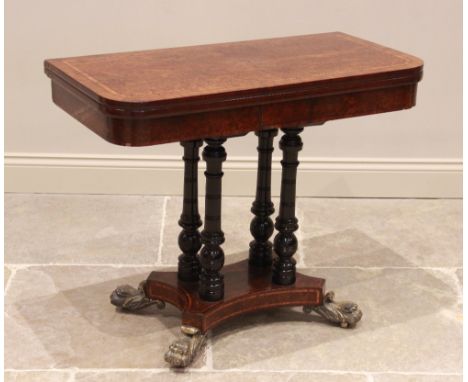 A mid 19th century burr thuya and rosewood crossbanded pedestal card table, the quarter veneered top opening to a baize lined