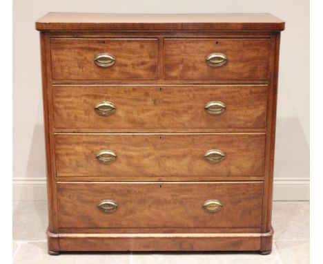 A 19th century mahogany chest of drawers, the rectangular top with rounded front corners over an arrangement of two short and