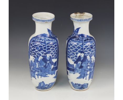 A pair of Chinese blue and white vases, 19th century, each of baluster form and decorated to the exterior with seated officia