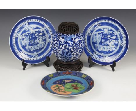 A Chinese porcelain blue and white ginger jar, 19th century, decorated with foliate motifs and scrolls, Kangxi four character