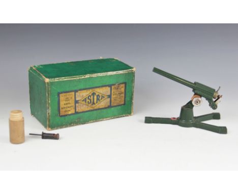 A boxed Astra-Pharos die-cast model Anti-aircraft gun, early 20th century, the gun with lever operated brass mounted sprung b