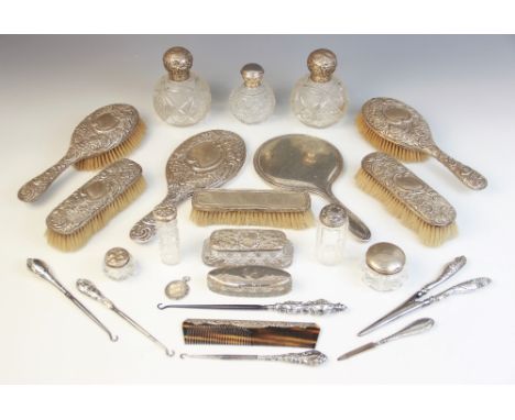 An Edwardian silver mounted dressing table set, A &amp; J Zimmerman Ltd, Birmingham 1901-03, comprising; a handheld mirror, t