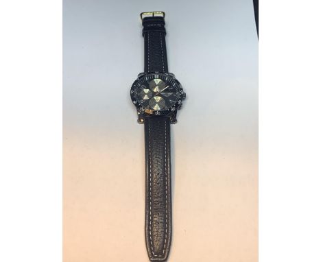 A CHRONOGRAPH WRIST WATCH WITH A BLACK LEATHER STRAP SEEN WORKING BUT NO WARRANTY 