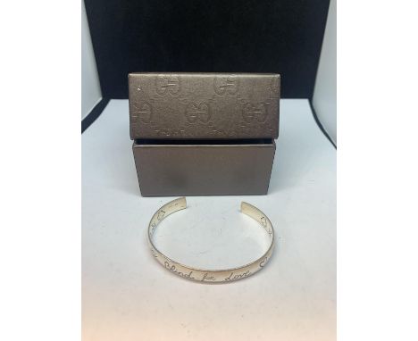 A GUCCI BLIND FOR LOVE BANGLE WITH A PRESENTATION BOX 